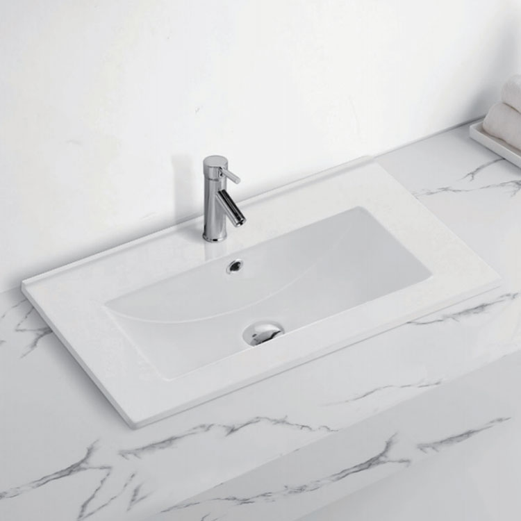 నా సిరామిక్ బాత్రూమ్ సింక్‌పై గీతలు ఎలా రిపేరు మరియు నిర్వహించగలను?